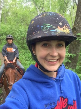 My mom and I enjoy the trails at 4-H horse camp. 